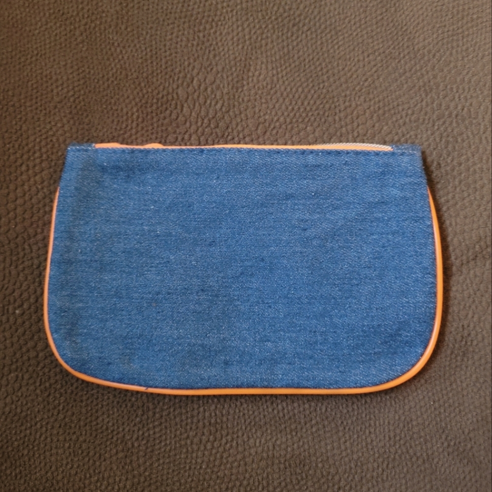 GUC. Ipsy blue jean makeup bag.